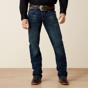 Men's Adkins low rise stretch boot cut jeans in a classic denim wash, exemplifying modern western wear.