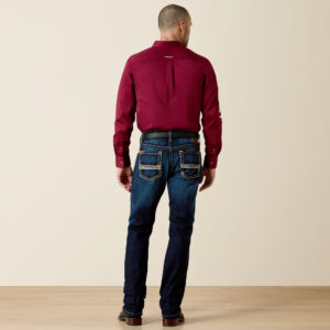 Man in a confident pose wearing the Concord Rocker slim straight jeans, a key piece of modern western wear.